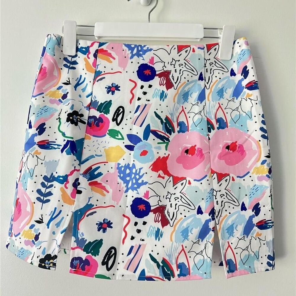 NWOT Multi-colored abstract floral print mini skirt with slits